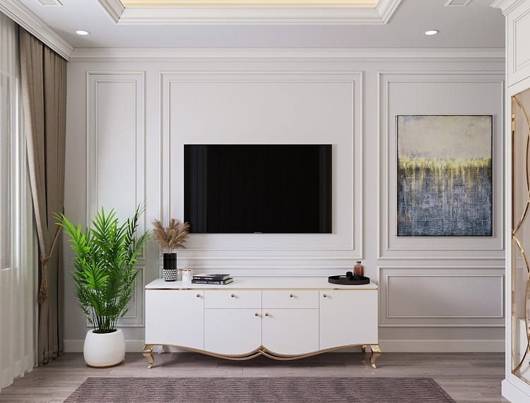 Tủ tivi được thiết kế với tone màu trắng kết hợp với kim loại vàng nổi bật 